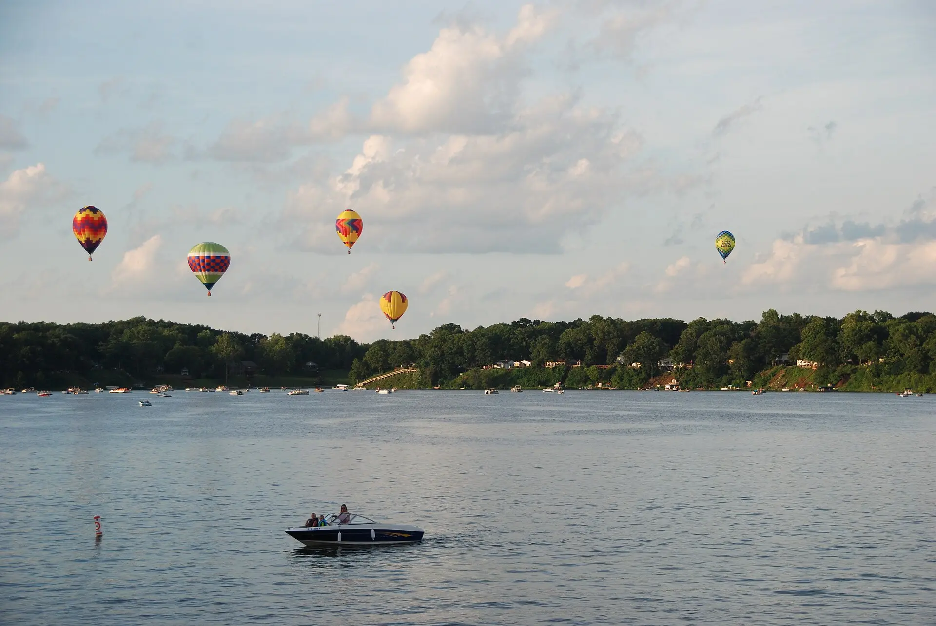 Hot air balloons over Lake Vermilion during a summer community event