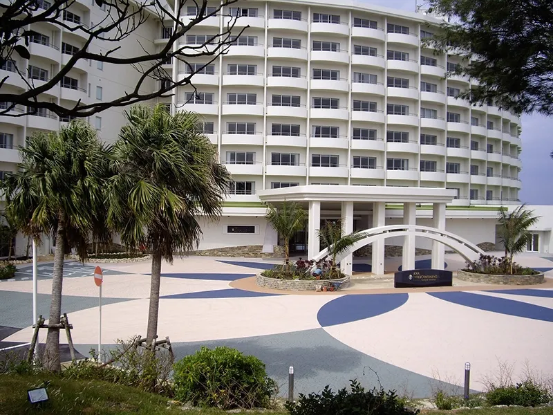 Hotel entrance drive with a large petal pattern in white, blue and gray